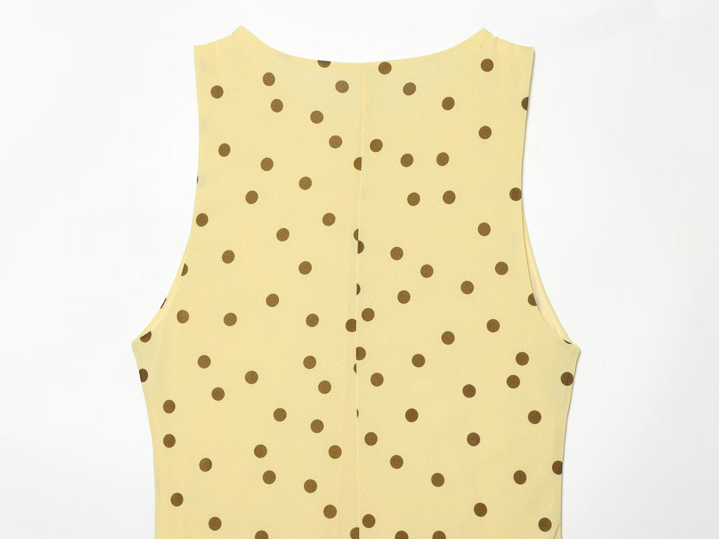 Women's sleeveless polka dot draped dress