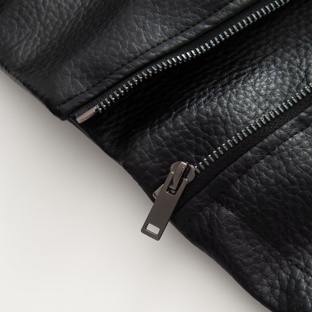 Women's high necked faux leather waistband jacket
