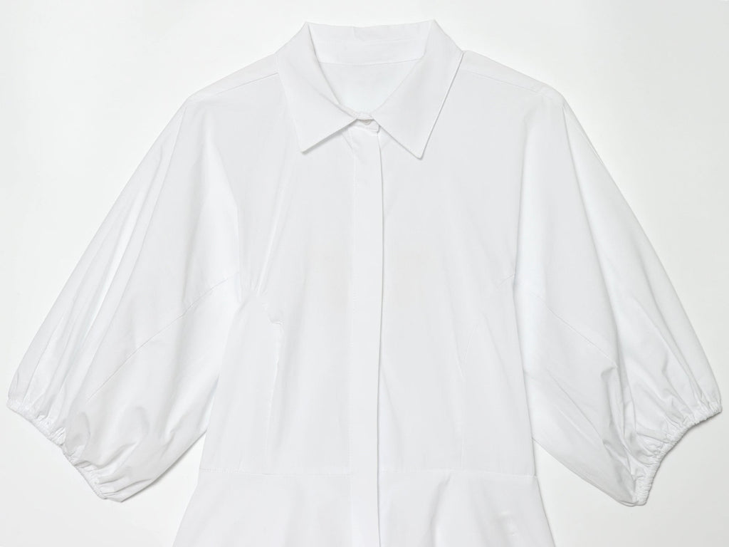 Women's skirt style hem bubble sleeve shirt