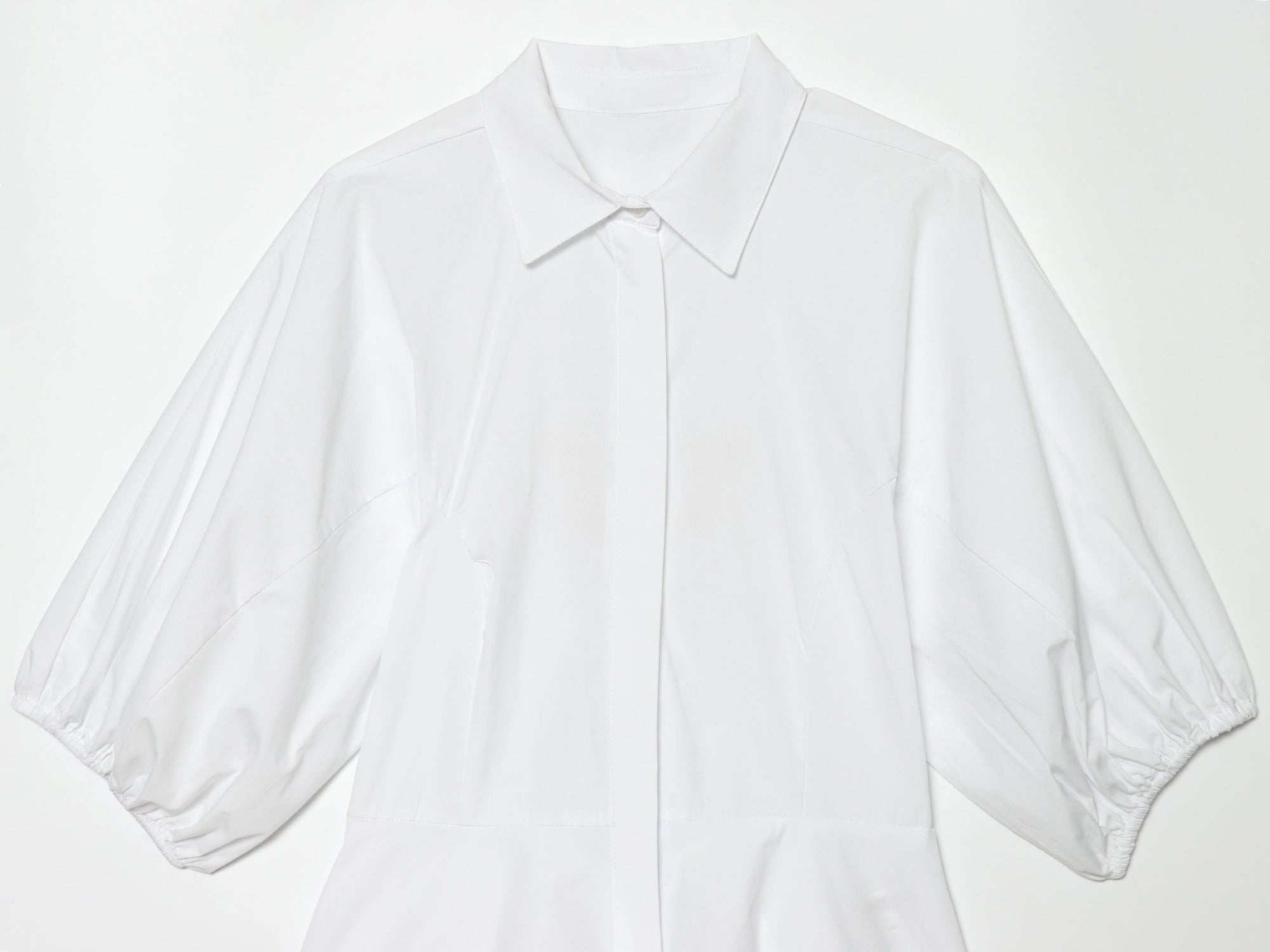 Women's skirt style hem bubble sleeve shirt
