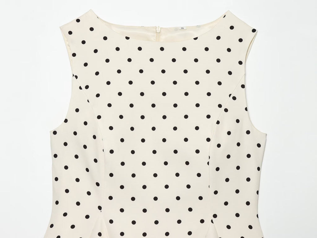 Women's ruffled hem polka dot sleeveless top
