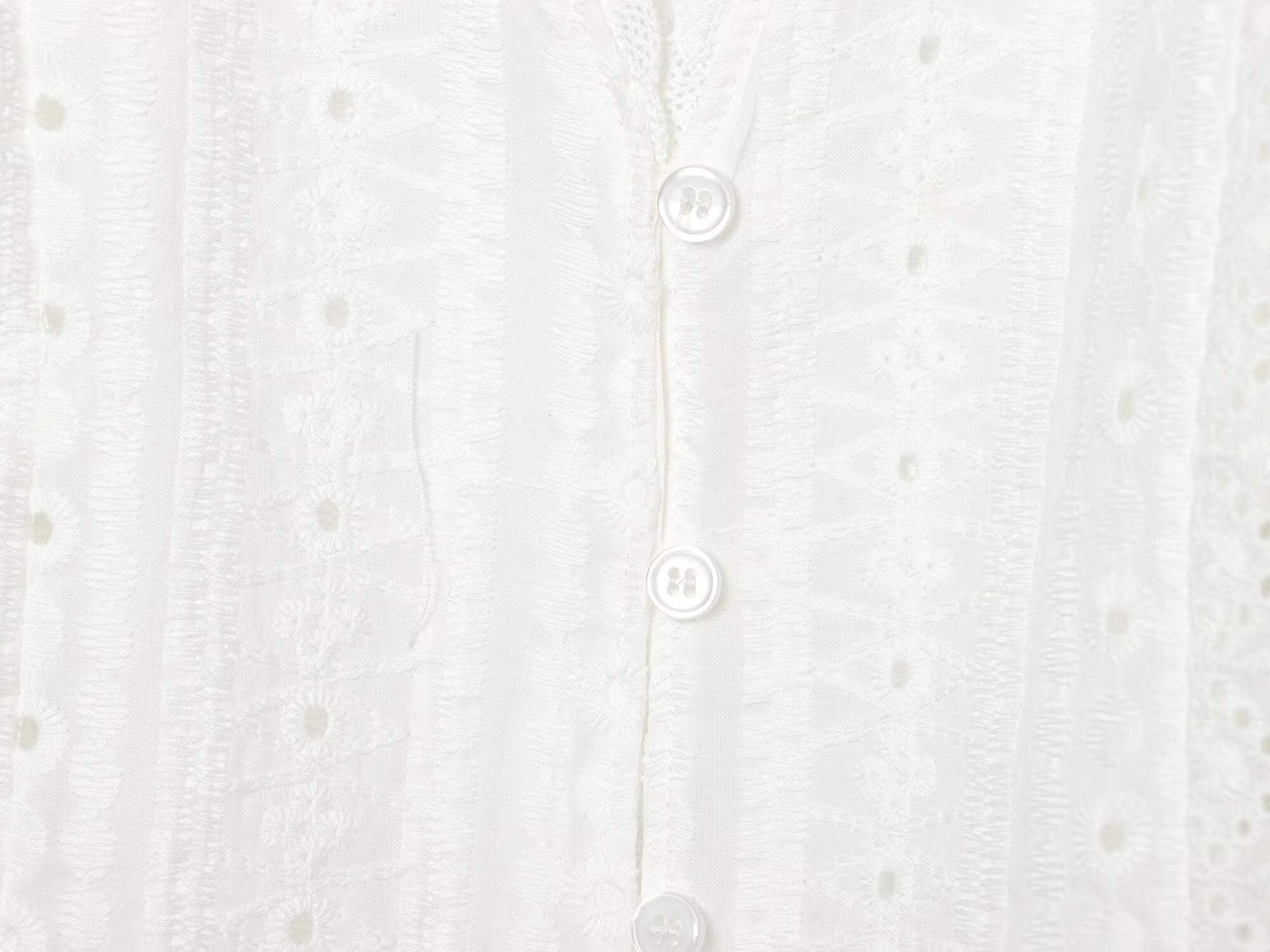 Women's hollowed out embroidered V-neck shirt