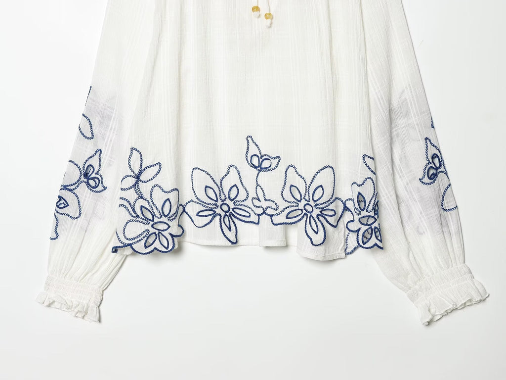 Women's floral embroidered lace up shirt