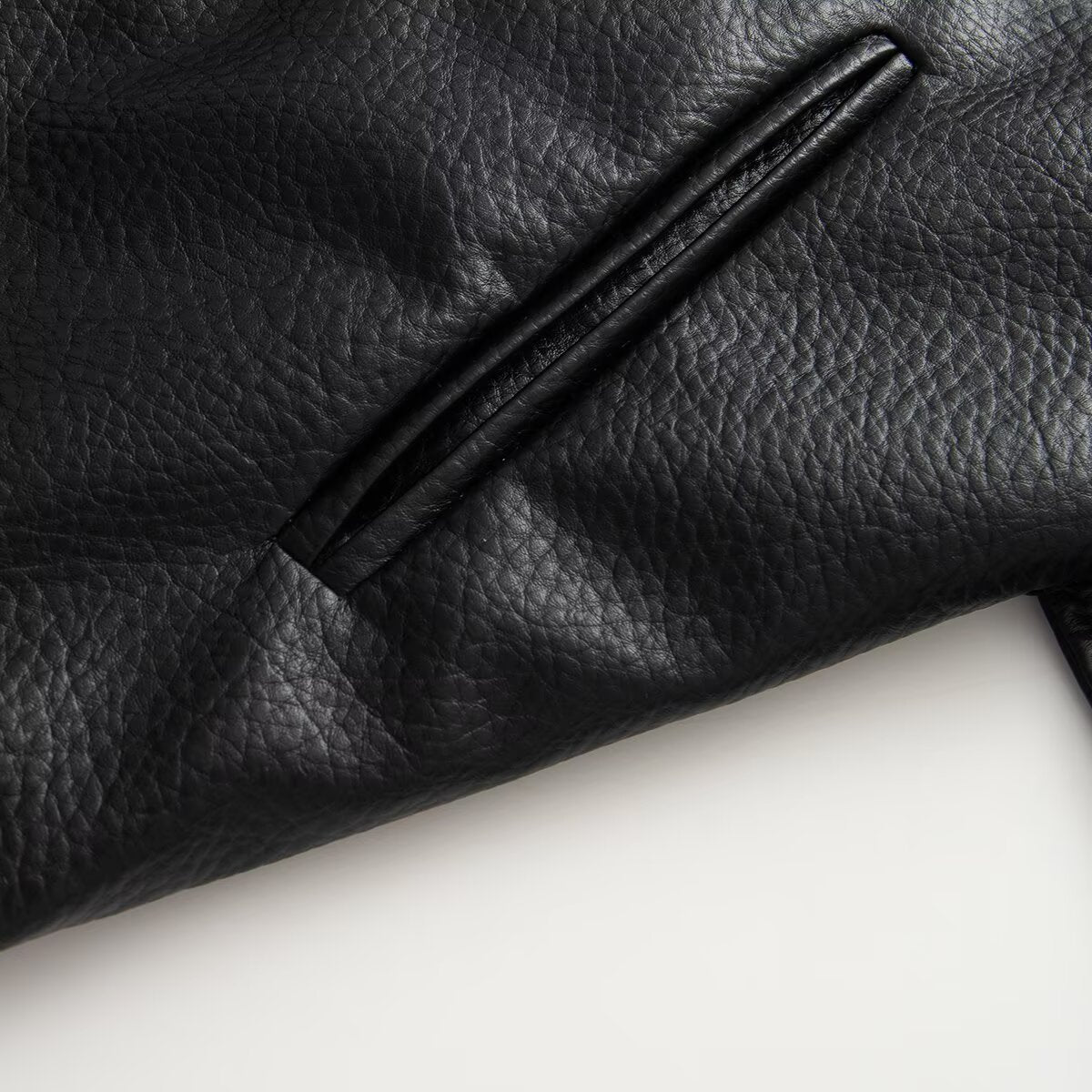 Women's high necked faux leather waistband jacket